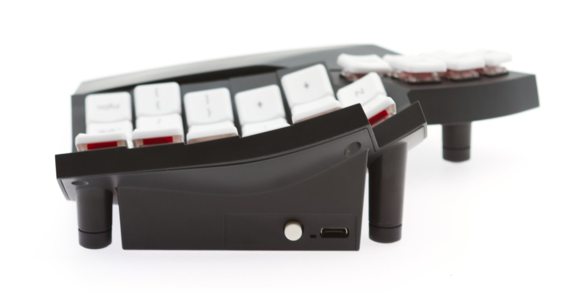 Side profile view of the Glove80 keyboard showing its low-profile height